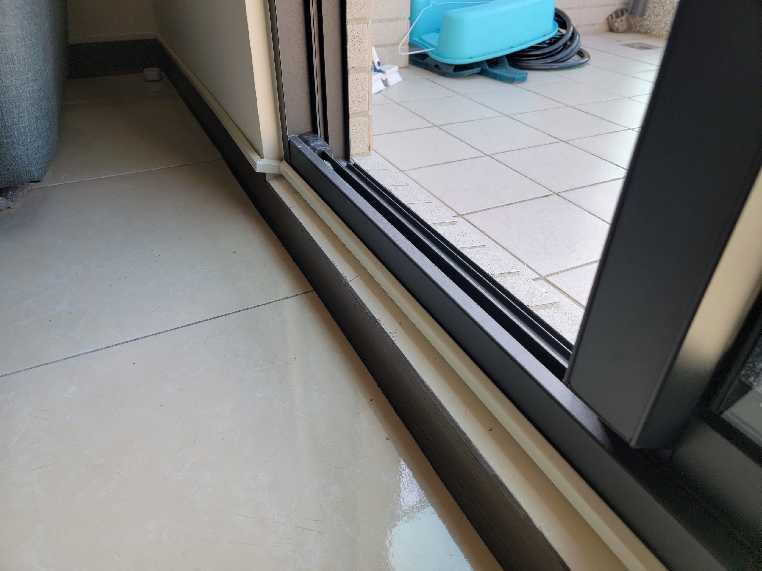 floor-to-ceiling window slide rail thresholds. 