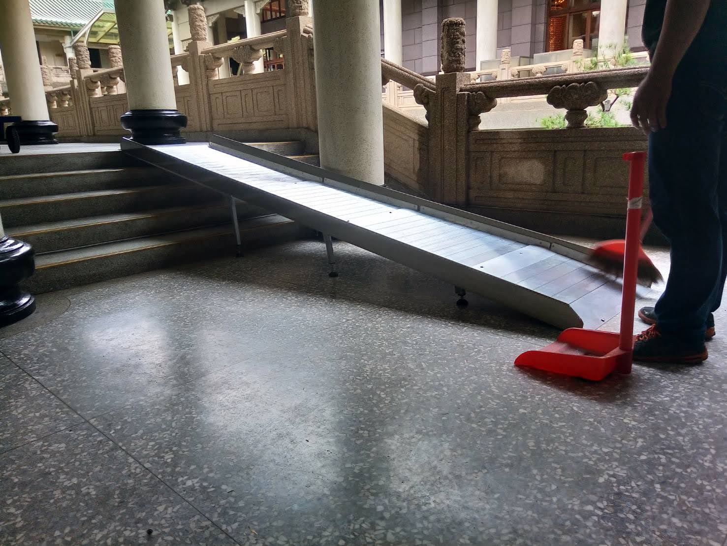 Portable barrier-free ramp for wheelchair.