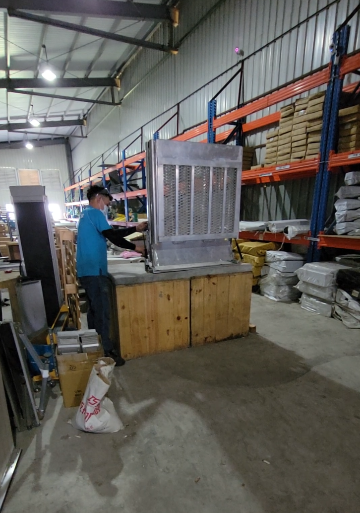 Rotate the wheelchair ramp 90 degrees to prepare for erection